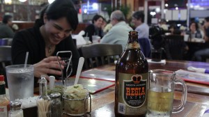 Regia beer, from El Salvador is served at El Atlakat in a 32 ounce bottle with a couple of beer mugs for sharing. 