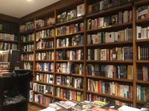 At Books & Books, a historic Coral Gables attraction, floor-to-ceiling bookshelves line the walls.