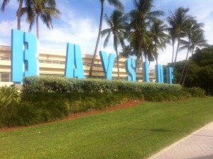 Bayside Marketplace entrance is marked with large blue letters that light up at night. Photo by Maleana Davis).