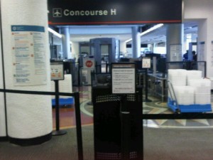 New security measures are posted at Miami International Airport (Photo by Brandon Lumish).