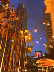 Dusk sets in behind the tealights on the Gordon Biersch patio on an evening on Brickell Avenue (Photo by Katherine Guest)..