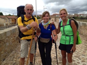 Egon Mes, Debbie Garson and Joni Lucci stop while crossing a bridge on their way to Astorga, a city along the Camino de Santiago (Photo courtesy of Joni Lucci).