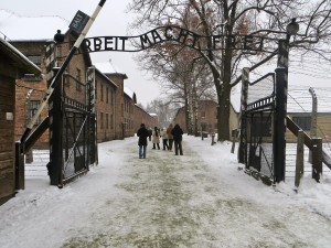 The gates at the entrance to Auschwitz reading "Arbeit MAcht Frei," or "work makes you free." The Nazis used this message to lull their prisoners into a false sense of security (Photo by Samantha Lucci).