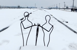 Human figurines made out of iron placed as a memorial at the end of the train tracks running through Auschwitz-Birkenau. Nazis used the tracks to bring captives to the camps during World War II (Photo by Samantha Lucci).