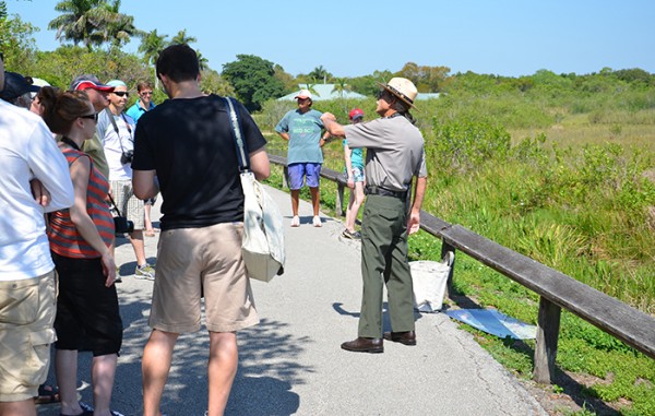 A park ranger talks to visitors at Royal Palm's Anhinga Trail in Everglades National Park (Staff photo).