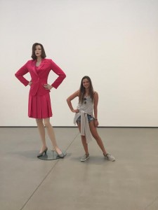 Madison Roehrig, 5-foot-8, looks minuscule next to the 8-foot statue 