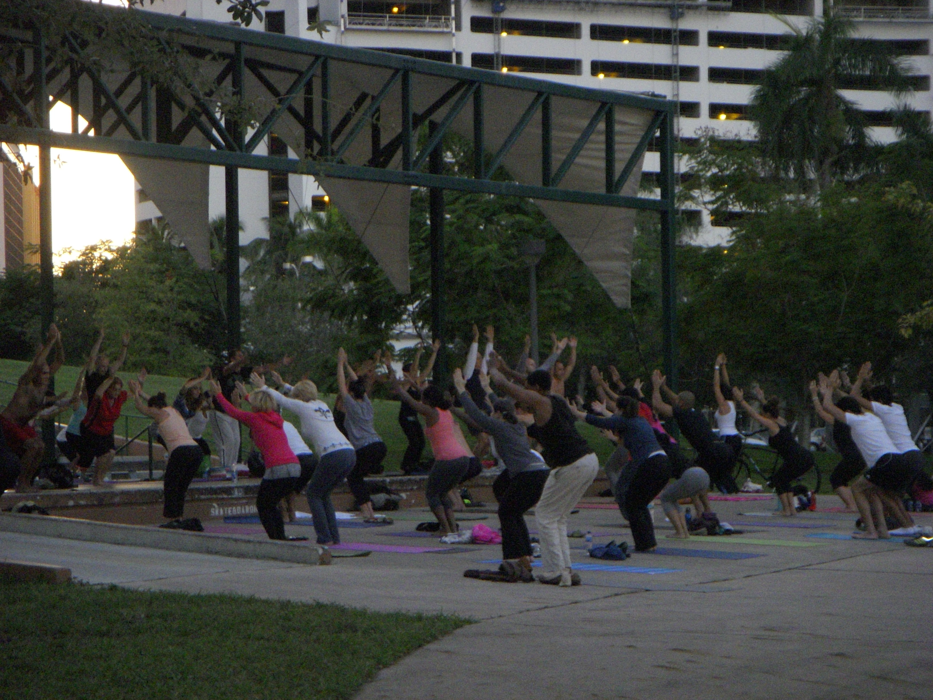 Locals, tourists and first-time yogis head on over to Tina Hills Pavilion in Bayfront Park for free yoga (Photo by Laurie Charles).